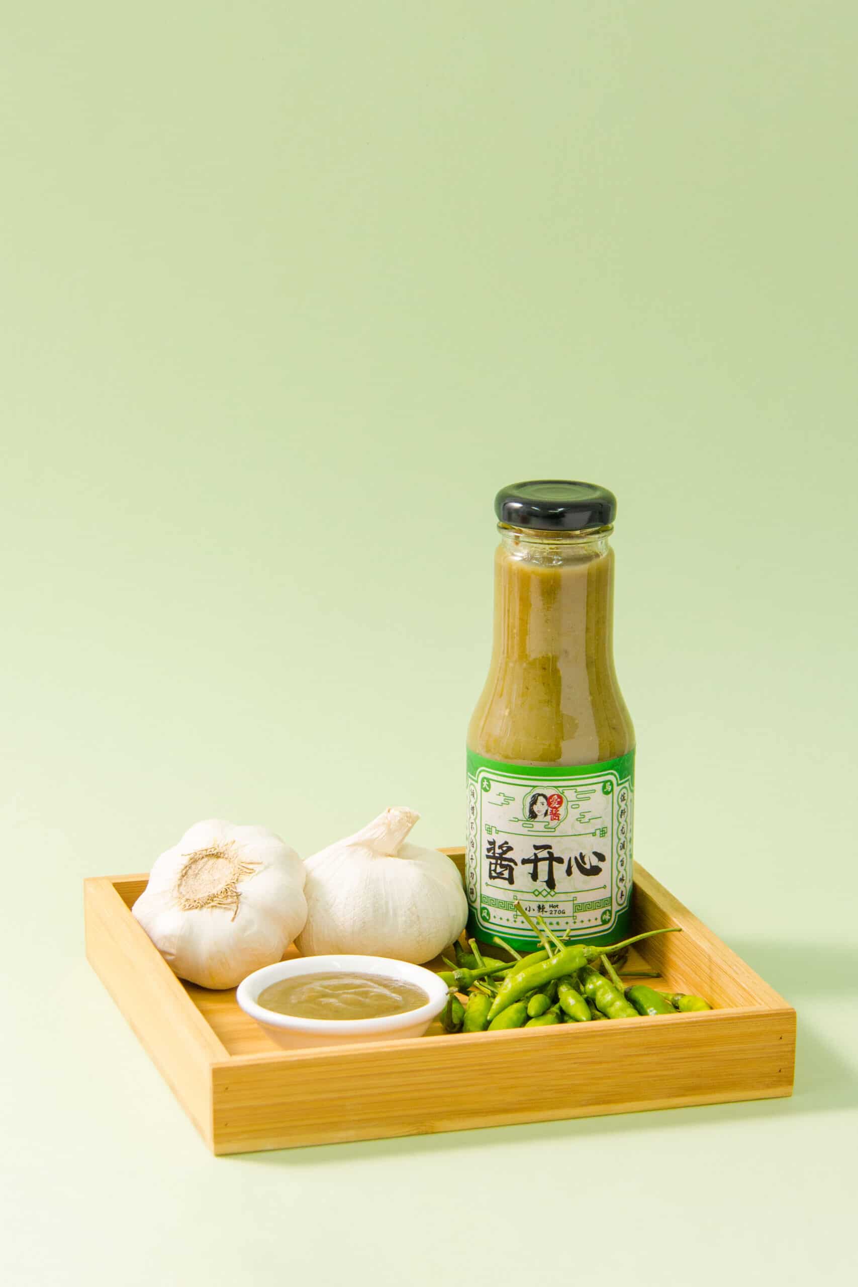 green chilies product photography with plate
